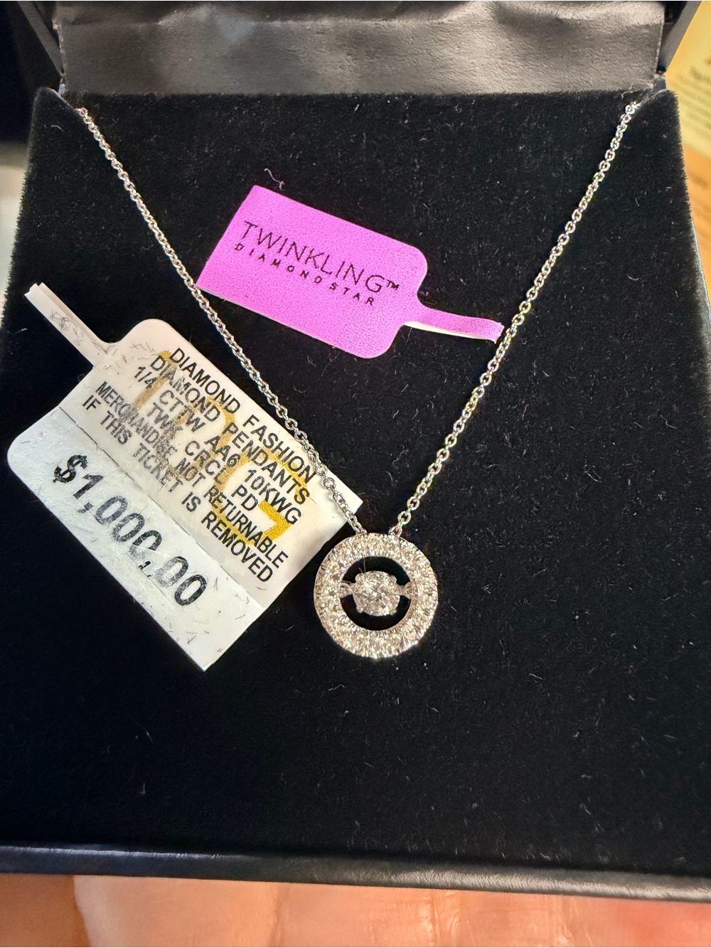 10k White Gold Floating Diamond Pendant Necklace.
